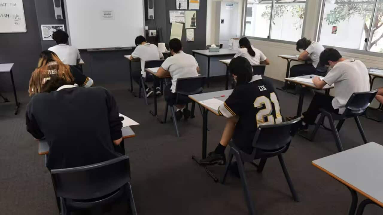 Students sitting Year 12 exams (AAP) Credit: MICK TSIKAS/AAPIMAGE