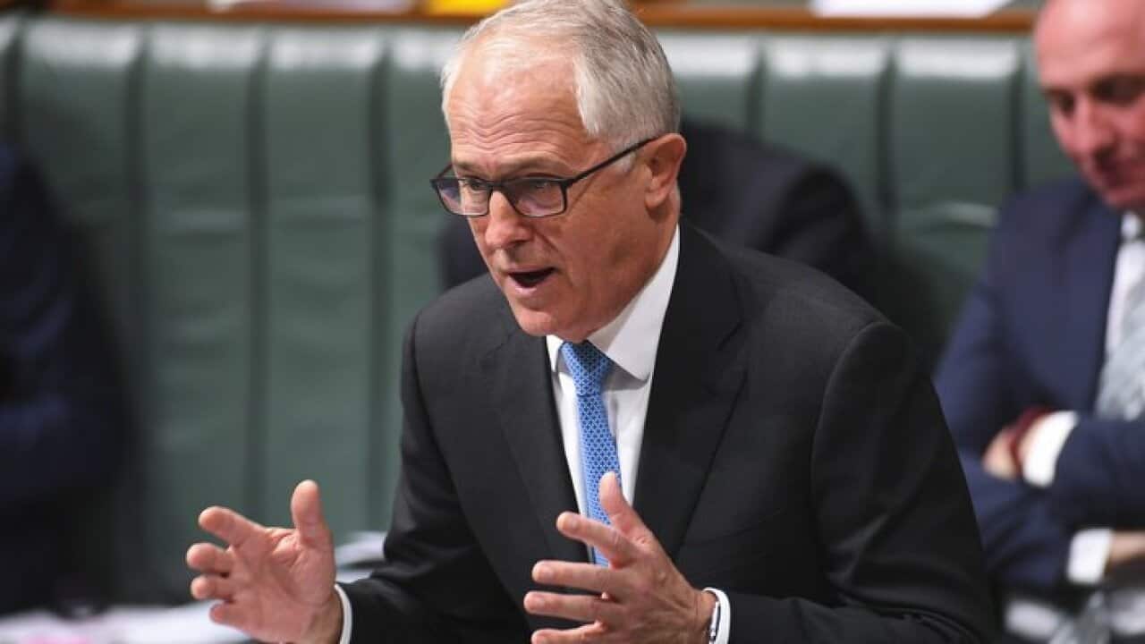 Australian Prime Minister Malcolm Turnbull speaks during House of Representatives Question Time at Parliament House in Canberra, Thursday, December 7, 2017. (AAP Image/Lukas Coch)