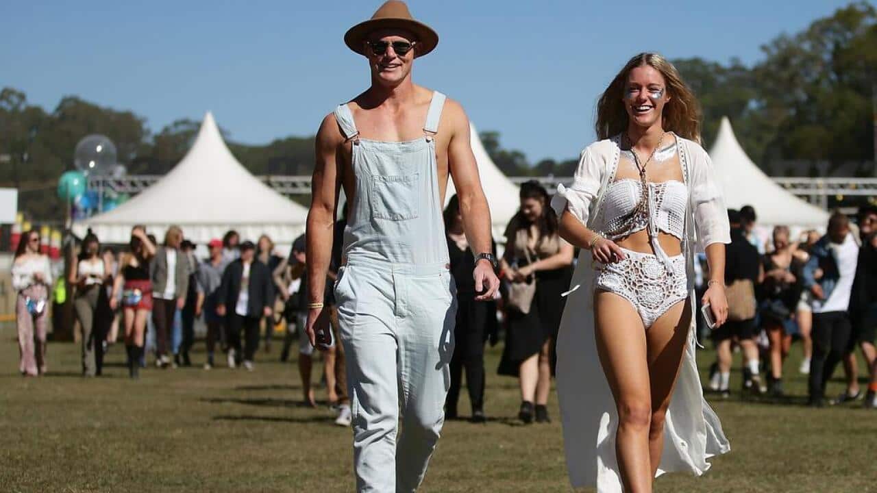 Young Australians enjoying themselves at a music festival.