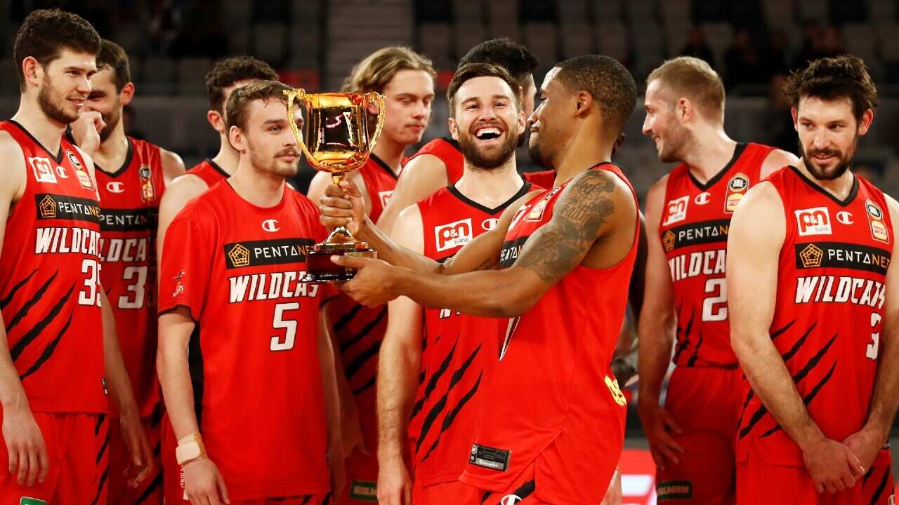 The Perth Wildcats celebrate their NBL Cup victory