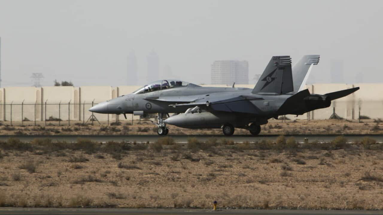A Royal Australian Air Force FA-18F Super Hornet returns to its base in the Middle East following a mission over Iraq