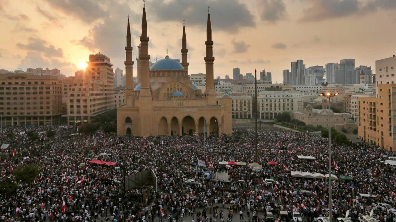 Anti-government protesters shout slogans during a protest in Beirut, Lebanon