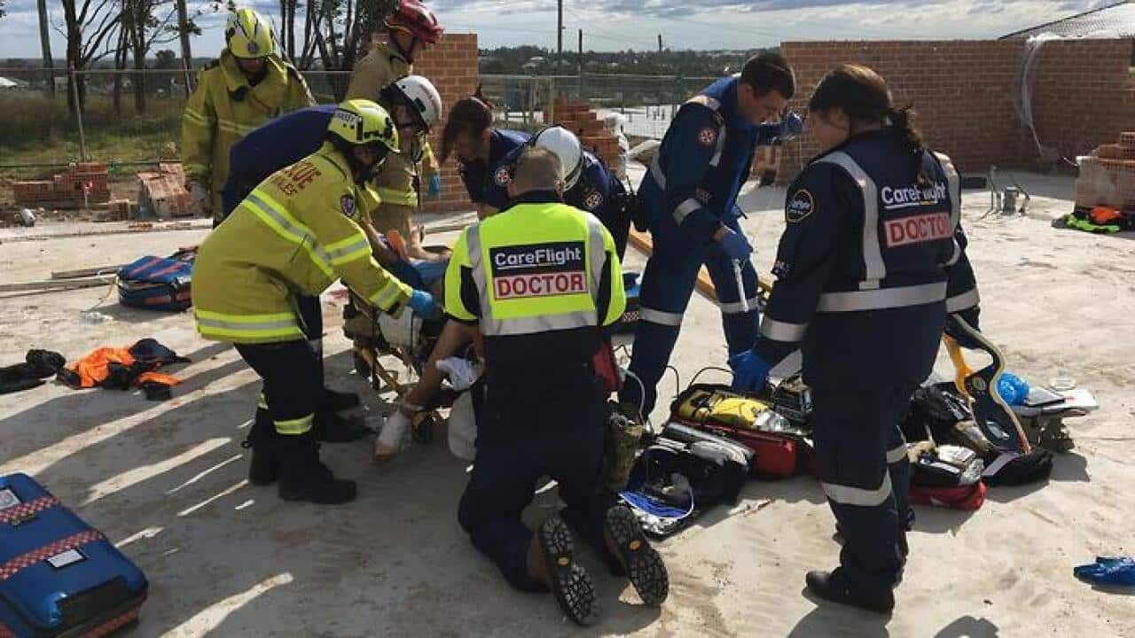 Supplied image of emergency services at the scene of a wall collapse in Kellyville, Sydney, Wednesday, August 16, 2017
