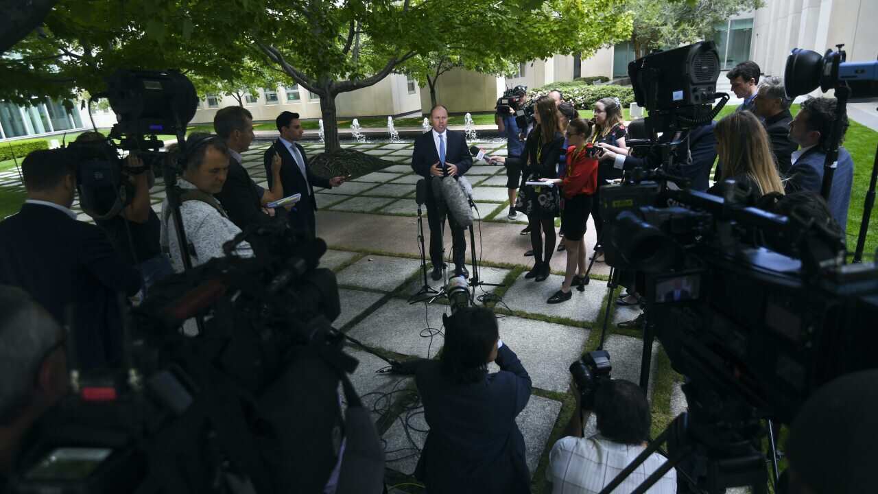 Australian Treasurer Josh Frydenberg speaks to the media during a press conference at Parliament House in Canberra on 17 February, 2021.