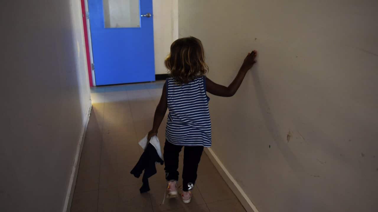 A child is seen at the Alice Springs Women's Shelter
