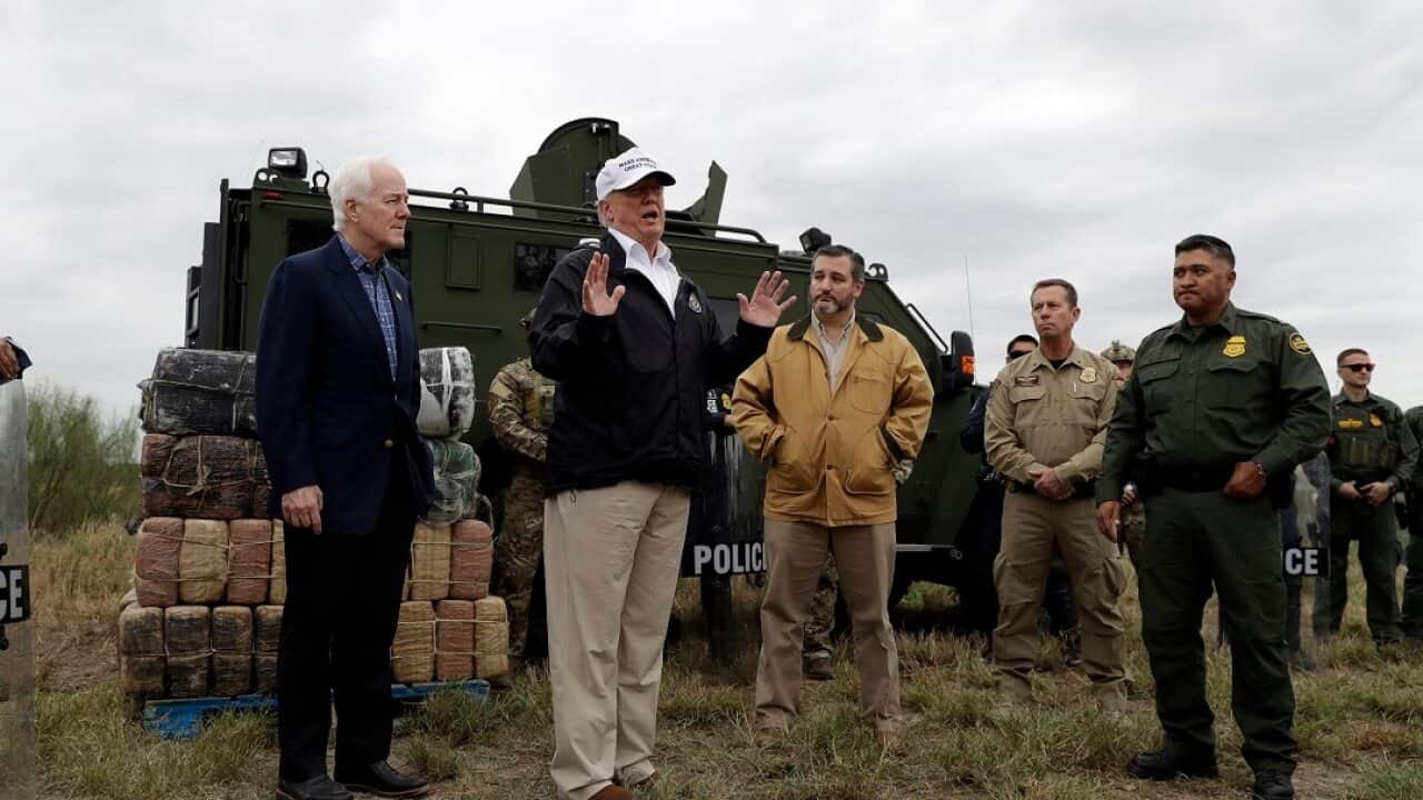 President Donald Trump speaks to the media as he tours the U.S. border with Mexico at the Rio Grande on the southern border, Thursday, Jan. 10, 2019, in McAllen, Texas. (AP Photo/ Evan Vucci)