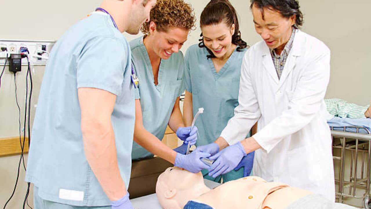 Medical staff being taught intubation