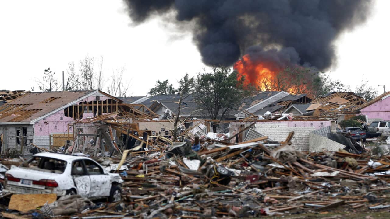 At least six people are dead after the monster Oklahoma City tornado, US TV networks report.