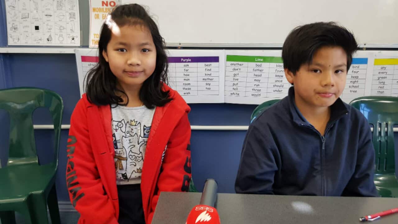 Kim Leang (R) and Sorth (L) of VSL Khmer Language class