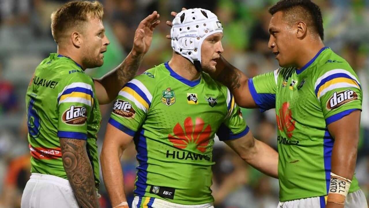 Raiders Jarrod Croker celebrates after scoring a try.