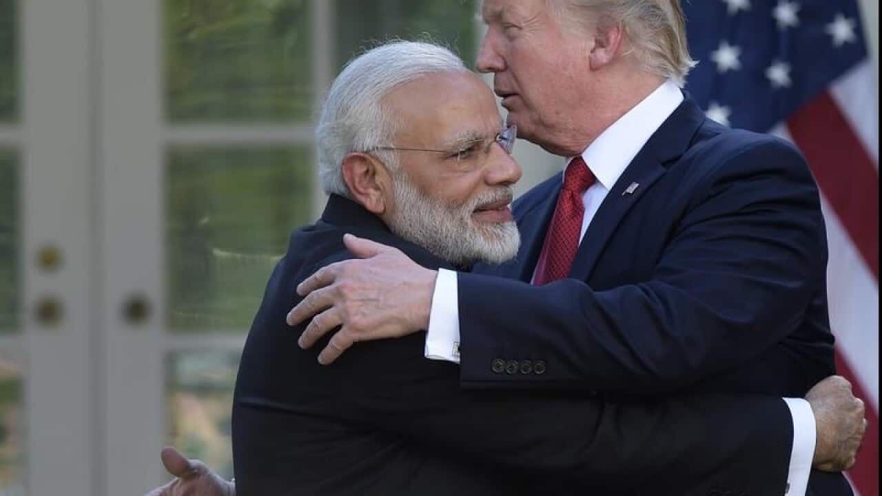 US President Donald Trump (R) and Indian Prime Minister Narendra Modi