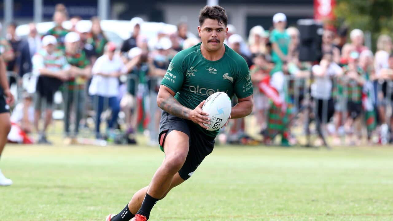 Latrell Mitchell of South Sydney passes the ball during a South Sydney Rabbitohs open training session at Carrara Sports Complex on the Gold Coast, Tuesday, September 28, 2021. (AAP Image/Jono Searle) NO ARCHIVING