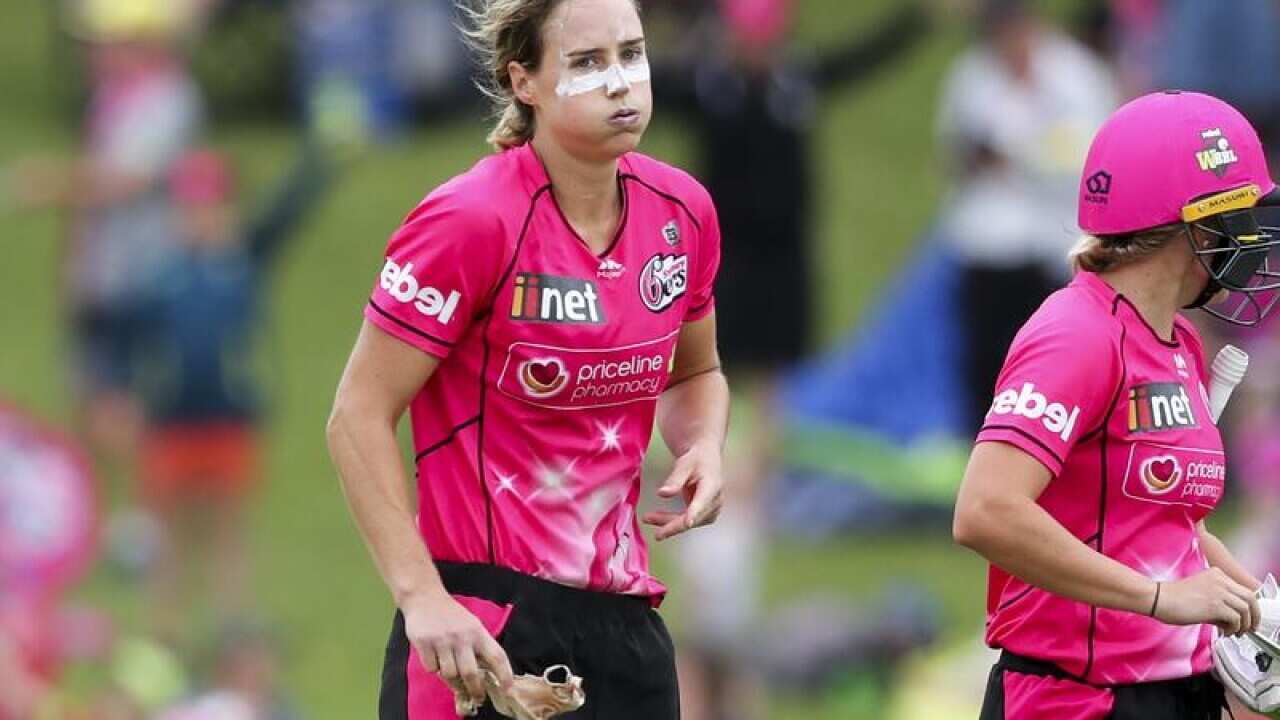 Ellyse Perry of the Sixers reacts
