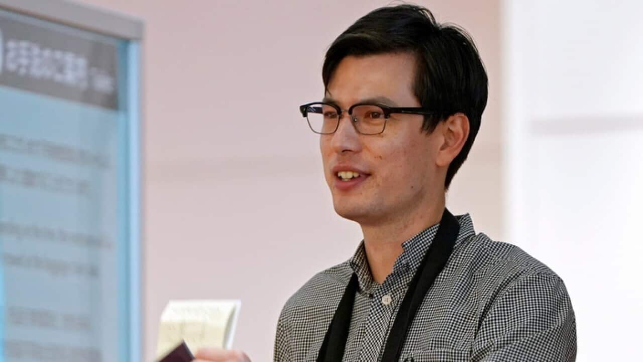 Alek Sigley arriving in Haneda Airport, Japan