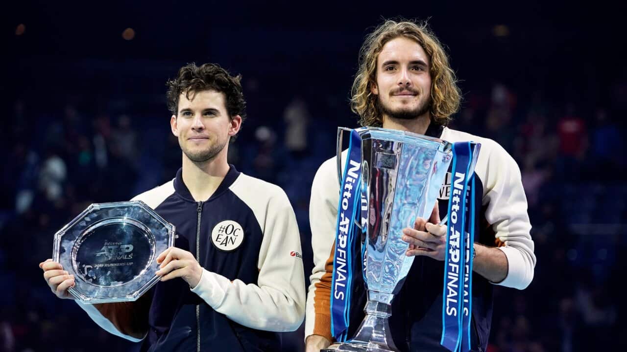 Stefanos Tsitsipas (R) of Greece poses with his trophy after winning the final match against Dominic Thiem (L) of Austria at the ATP World Tour Finals tennis tournament in London, Britain, 17 November 2019. EPA/WILL OLIVER