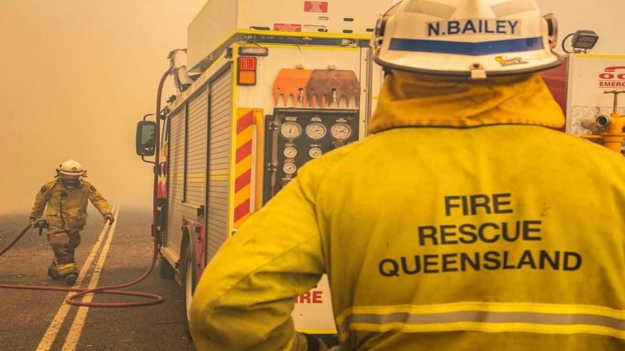 firefighters working to control a bushfire in Central Queensland