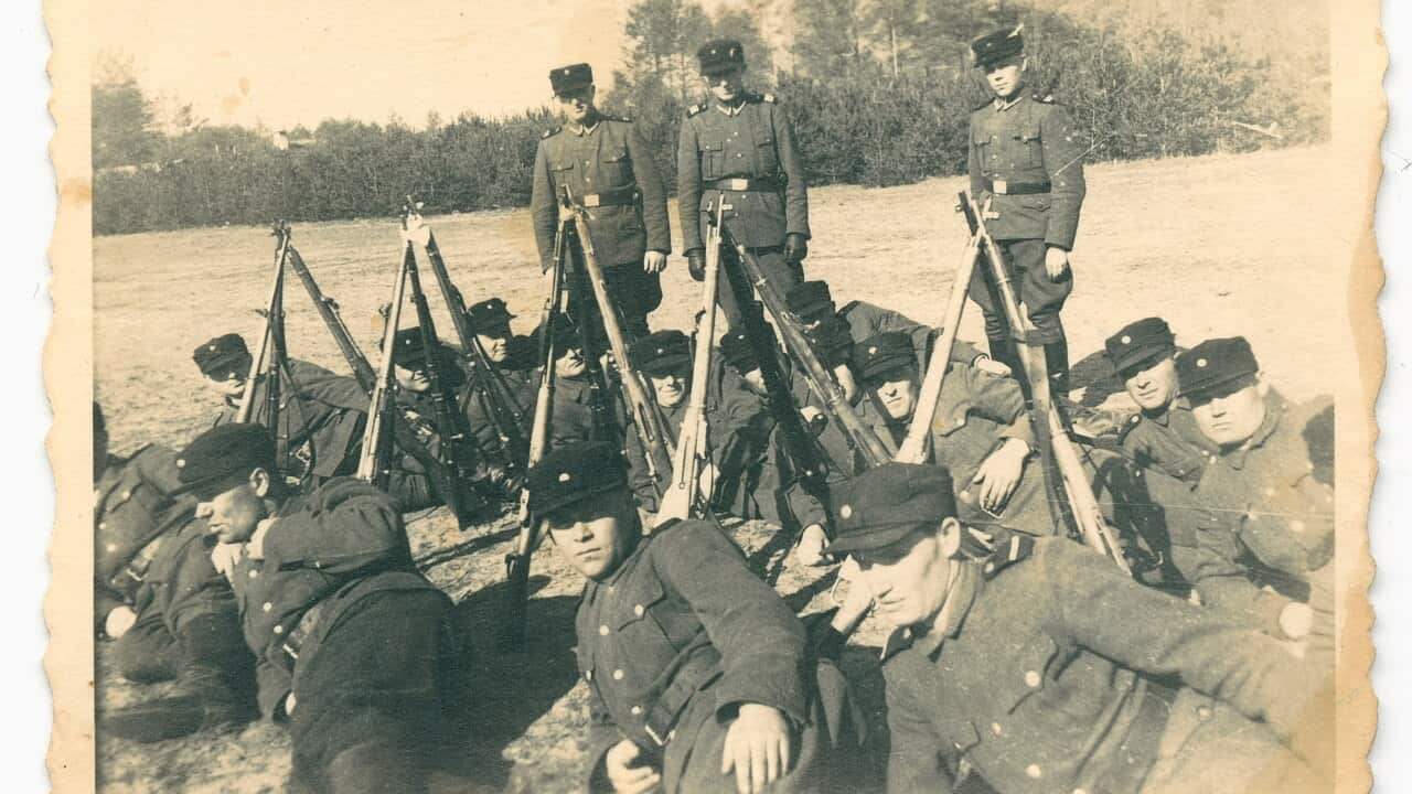 This 1943 photo provided by the US Holocaust Memorial Museum shows a group of auxiliary guards at the Nazi death camp Sobibor in German-occupied Poland.
