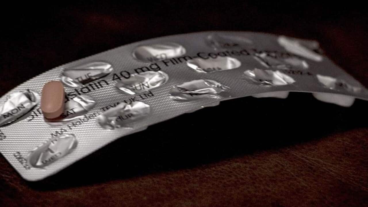 a satin tablet on an empty packet