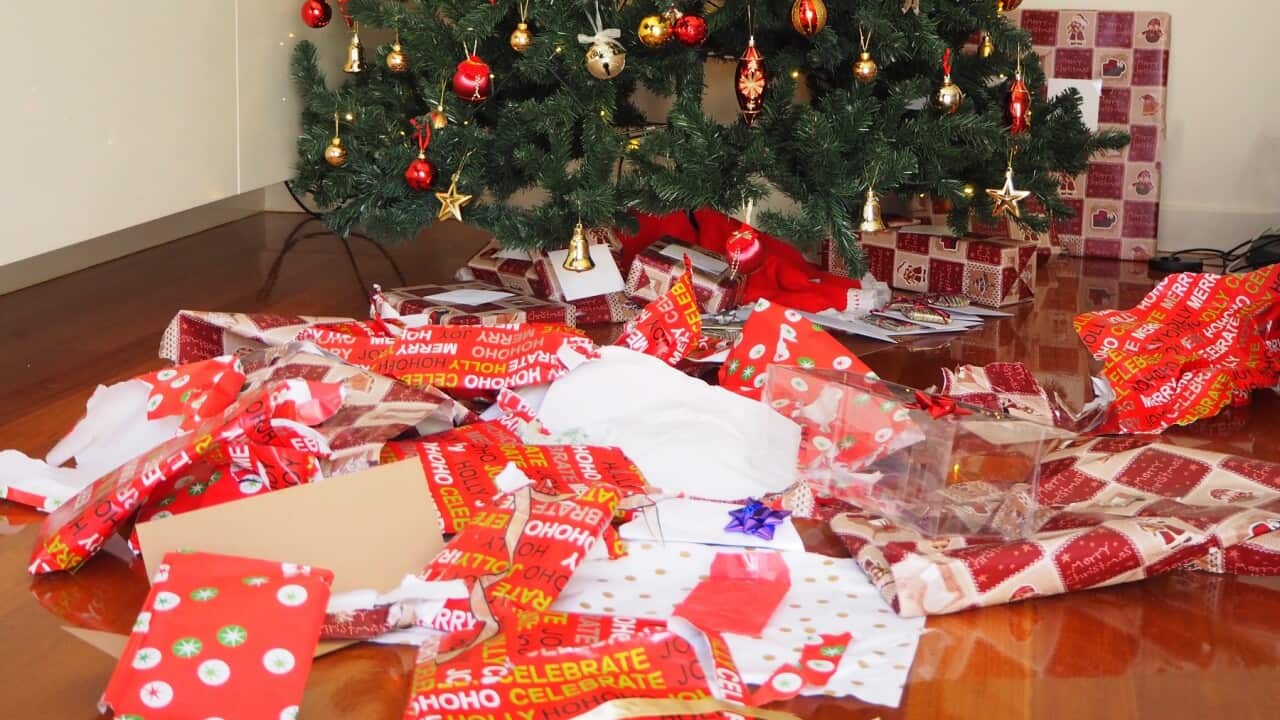 Australians expected to use more than 150,000 kilometres worth of wrapping paper this Christmas (Getty)