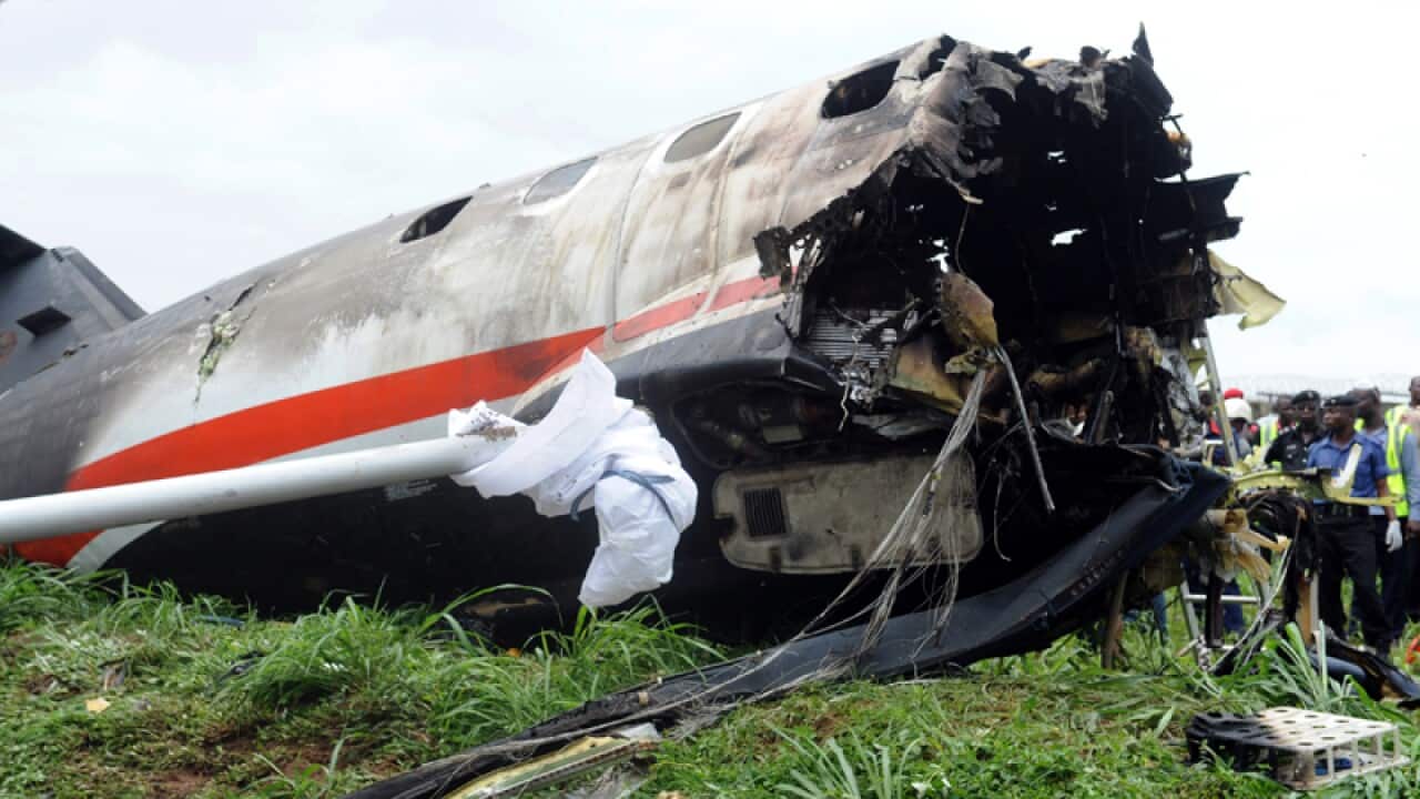 The wreckage of the Nigerian charter plane