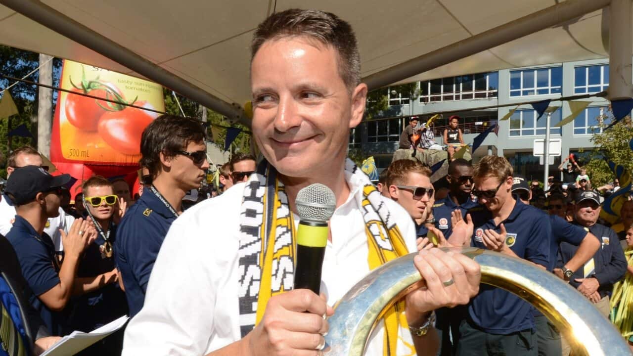 Central Coast Mariners owner Mike Charlesworth with the A-League Championship in 2013