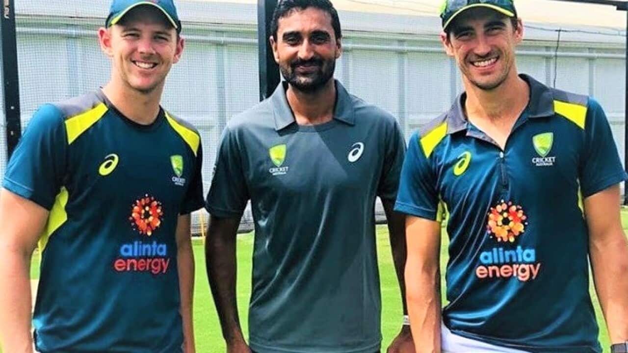 Cricketer Mohammad Irfan Jr with Australian bowlers Josh Hazlewood (left) and Mitchell Starc (right).