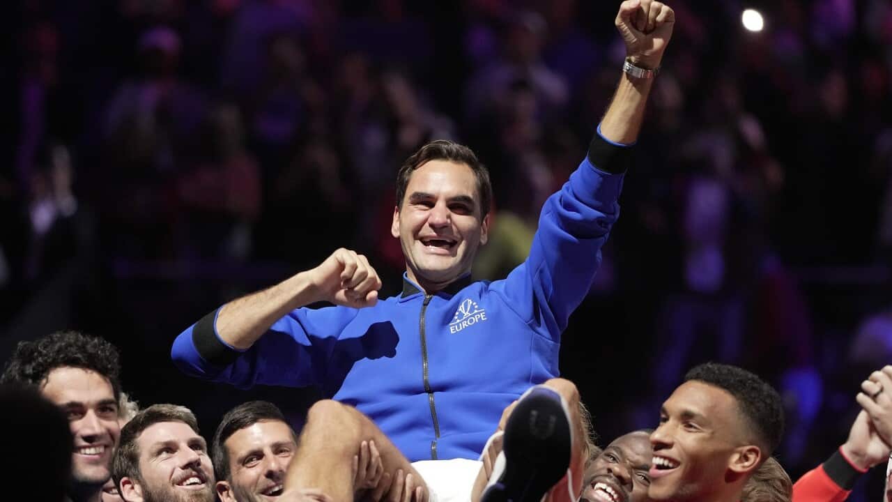 Team Europe's Roger Federer is lifted by fellow players after playing with Rafael Nadal in a Laver Cup doubles match against Team World's Jack Sock and Frances Tiafoe.
