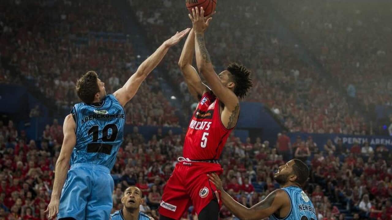 Jean-Pierre Tokoto of the Perth Wildcats takes a shot