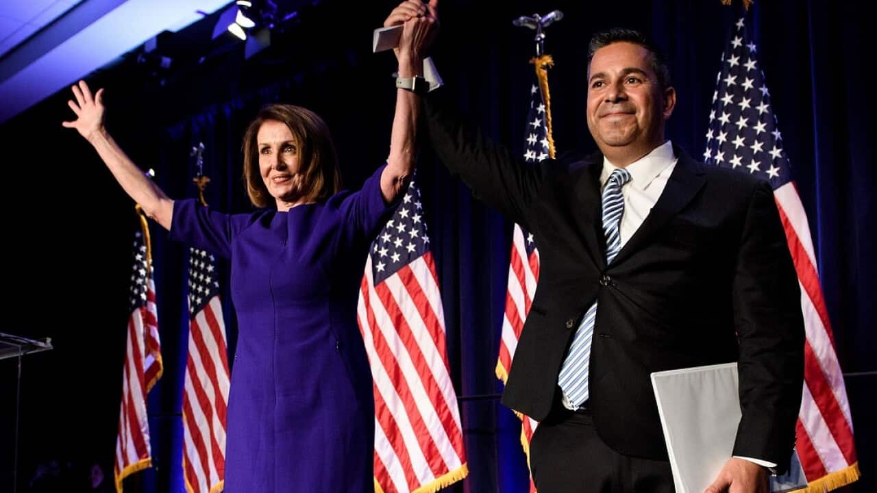 House Minority Leader Nancy Pelosi and Representative Ben Ray Lujan celebrate the result.