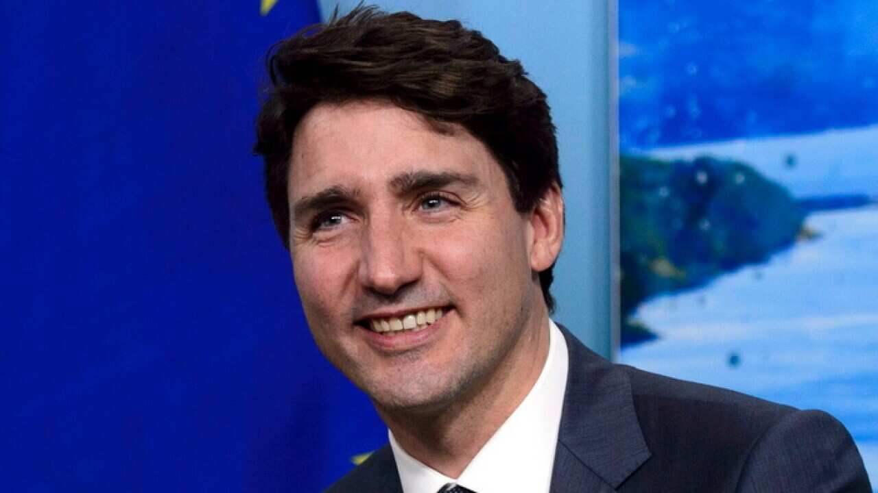 Prime Minister Justin Trudeau takes part in a meeting with EU leaders at the G7 Leaders Summit in La Malbaie, Quebec, Thursday, June 7, 2018. (Sean Kilpatrick/The Canadian Press via AP)