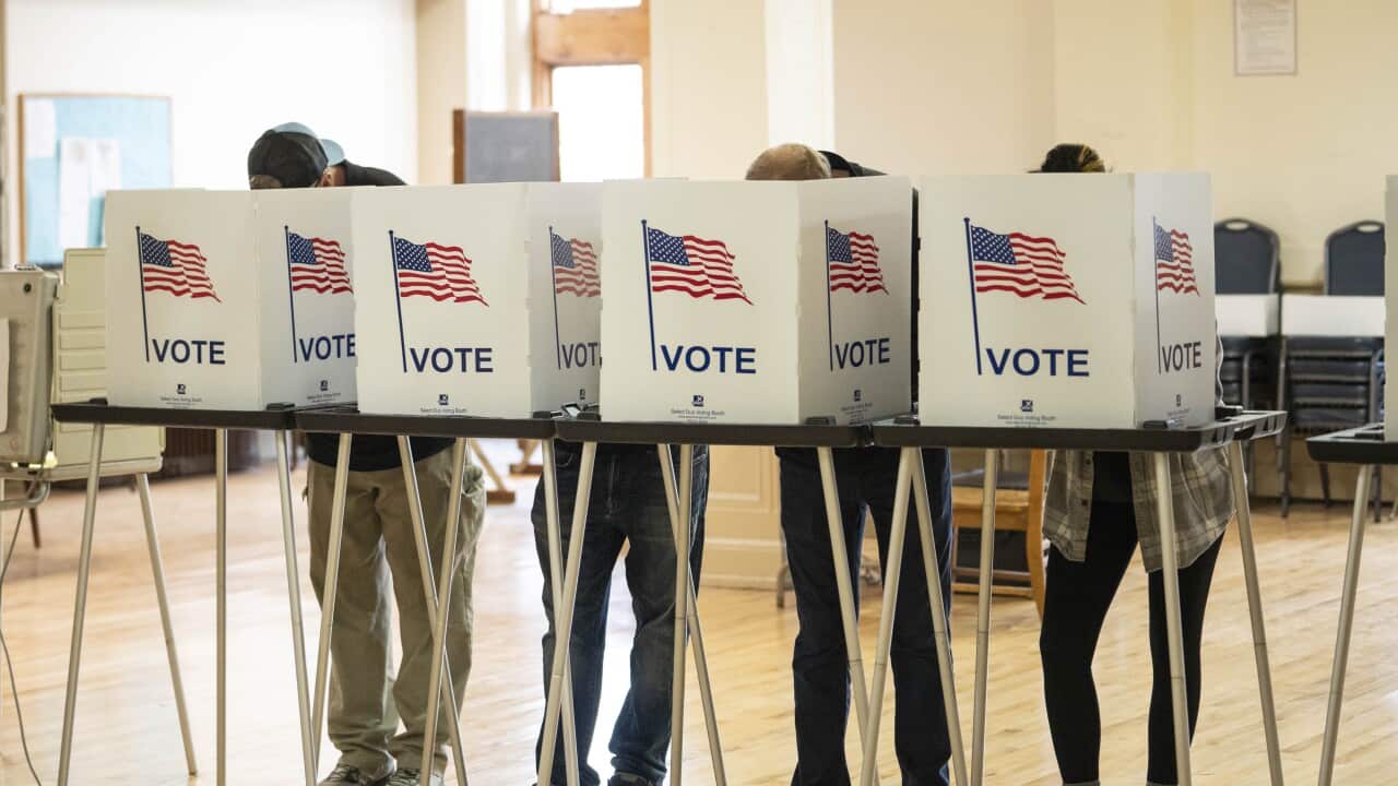 People voting in the US election at a polling booth