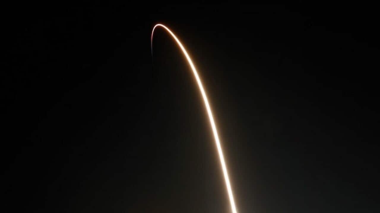 SpaceX Falcon 9 rocket with a demo Crew Dragon spacecraft on an uncrewed test flight to the International Space Station