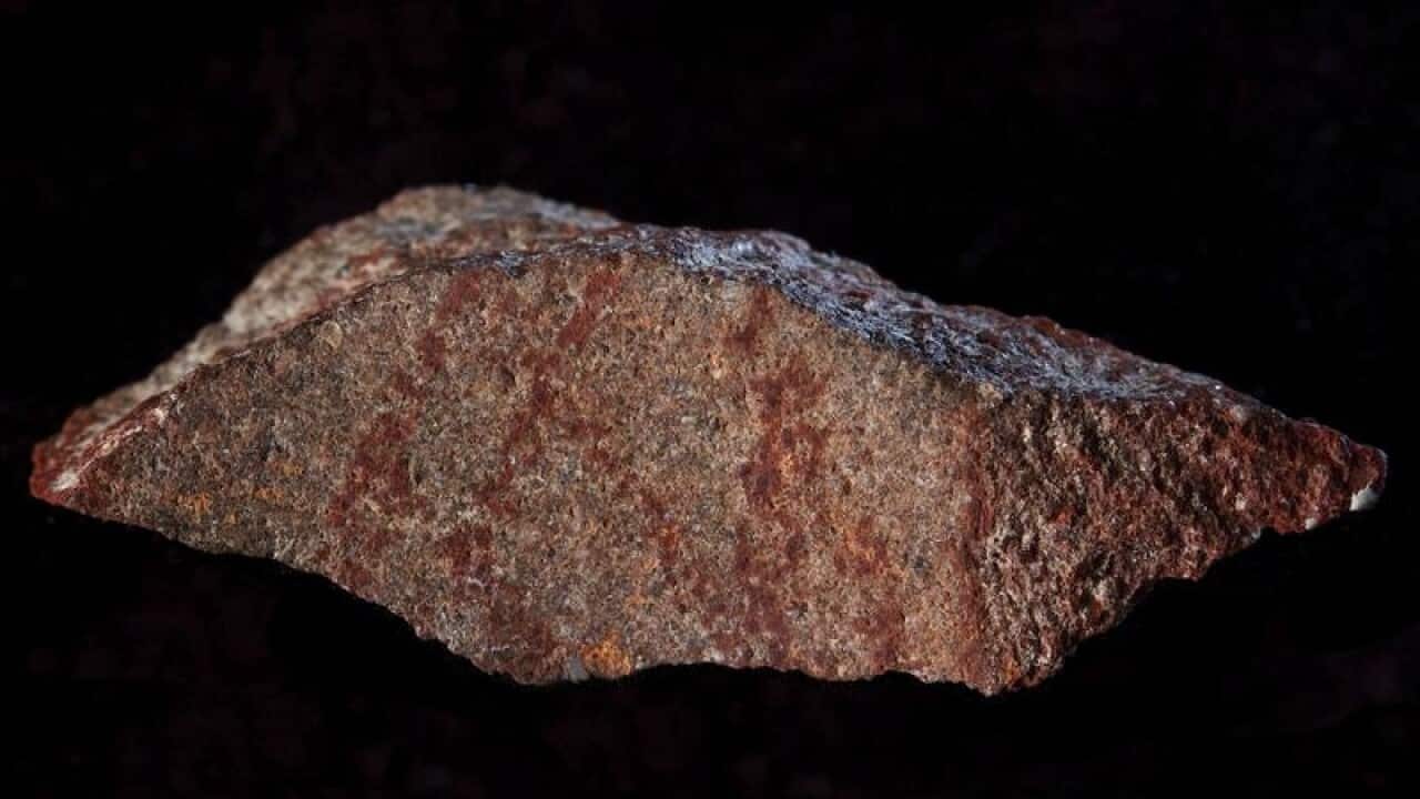 Scientists say a 73,000-year-old sketch found in a South African cave is the oldest known drawing.