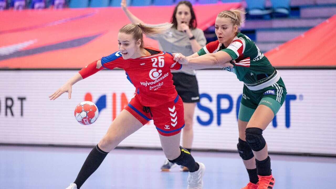 Jovana Jovovic (L) of Serbia in action with Noemi Hafra of Hungary during the EHF EURO 2020 European Women's Handball preliminary round match between Serbia and Hungary at Sydbank Arena in Kolding, Denmark, 06 December 2020.