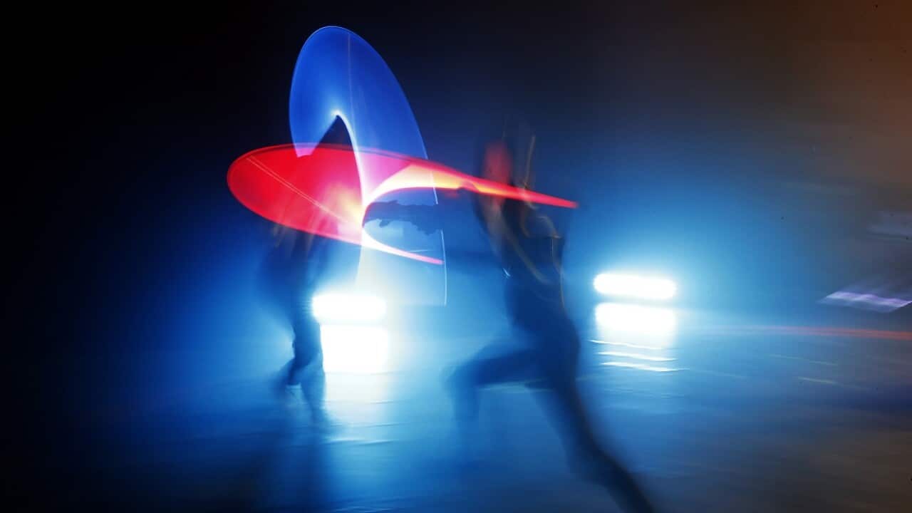 In this Sunday, Feb. 10, 2019, photo, competitors battle during a national lightsaber tournament in Beaumont-sur-Oise, north of Paris.