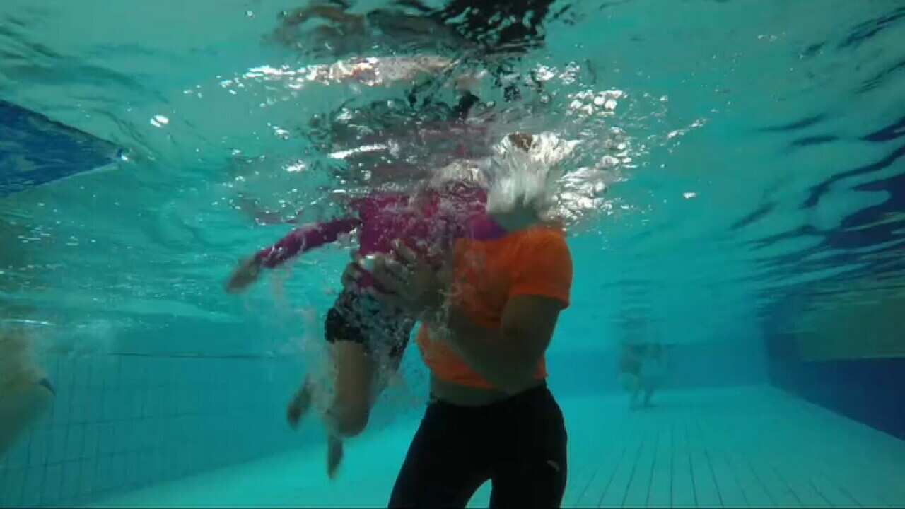 child water safety learn to swim ocean refugee
