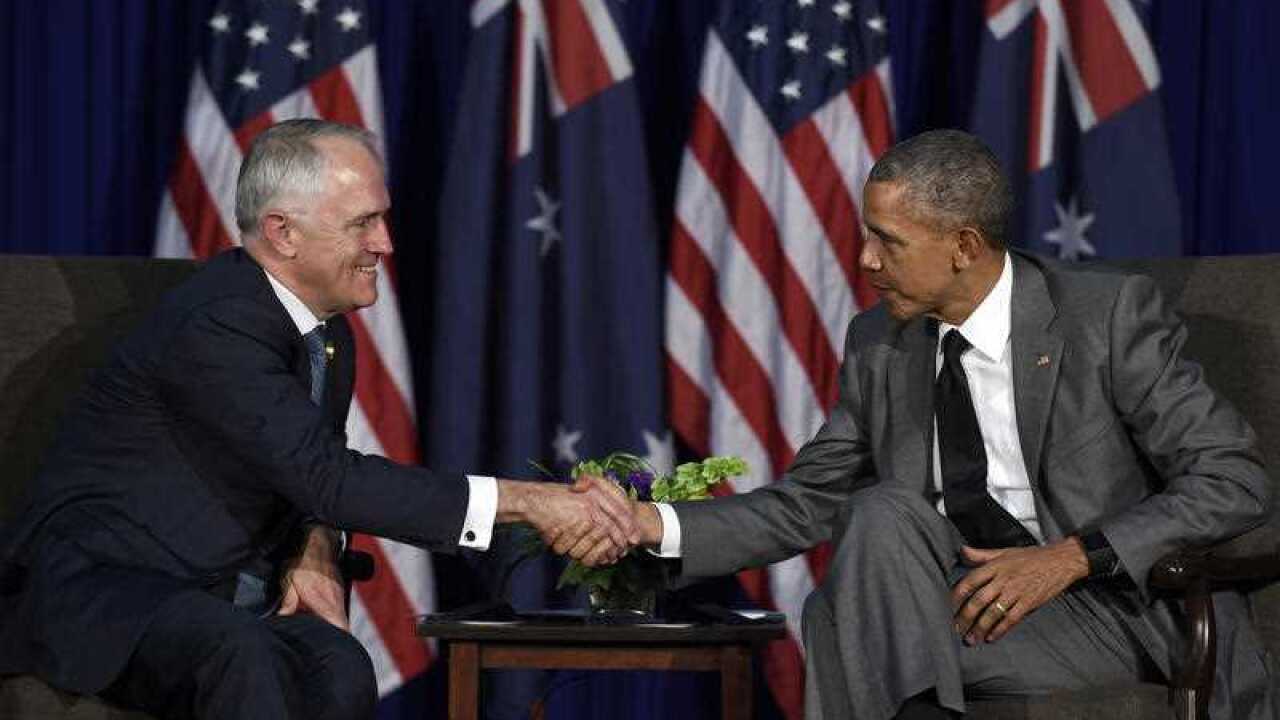 US President Barack Obama shakes hands with Australia's Prime Minister Malcolm Turnbull during their meeting in Manila
