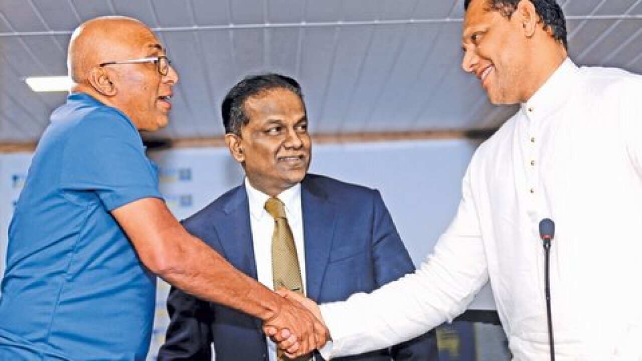 Chandika Hathurusinghe with the Cricket chairmen and the sports miniter of Sri Lanka