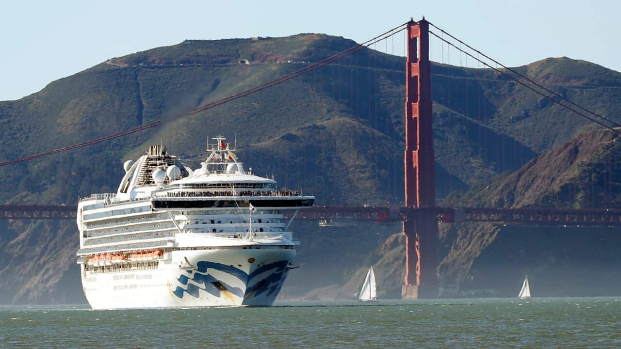 The Grand Princess cruise ship passes the Golden Gate Bridge as it arrives from Hawaii in San Francisco