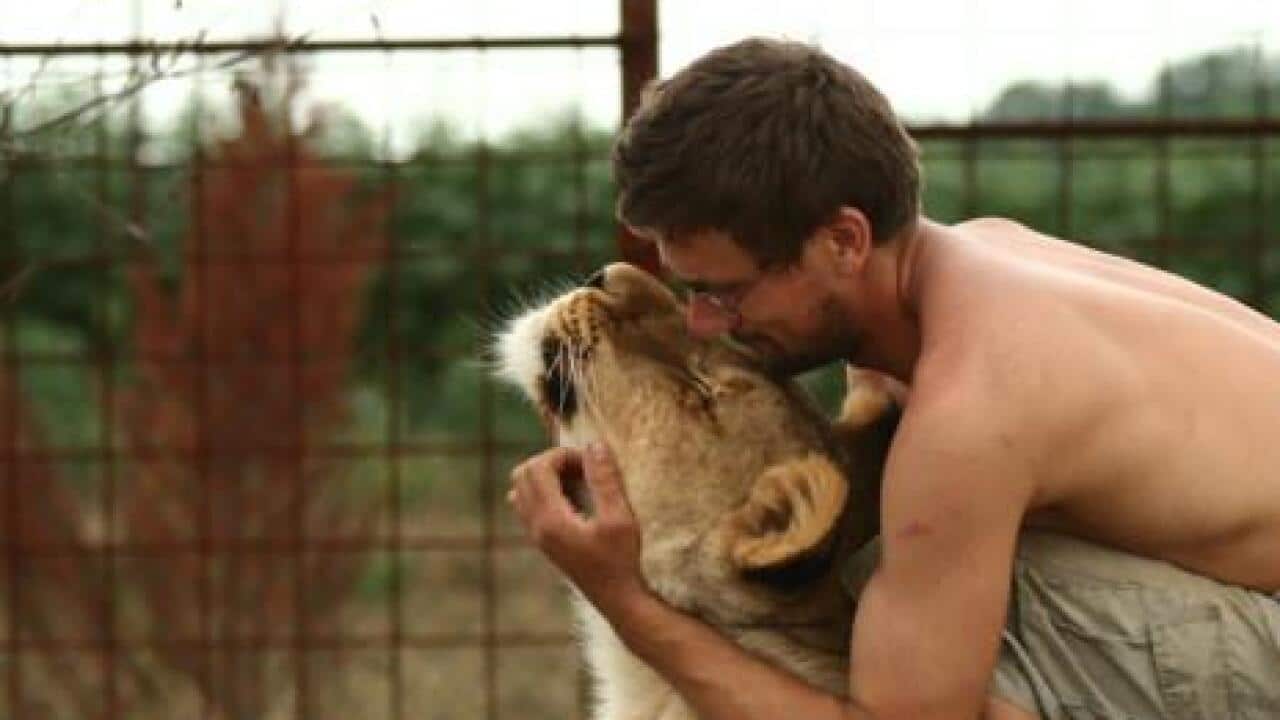 Michal Prasek with one of his lions.
