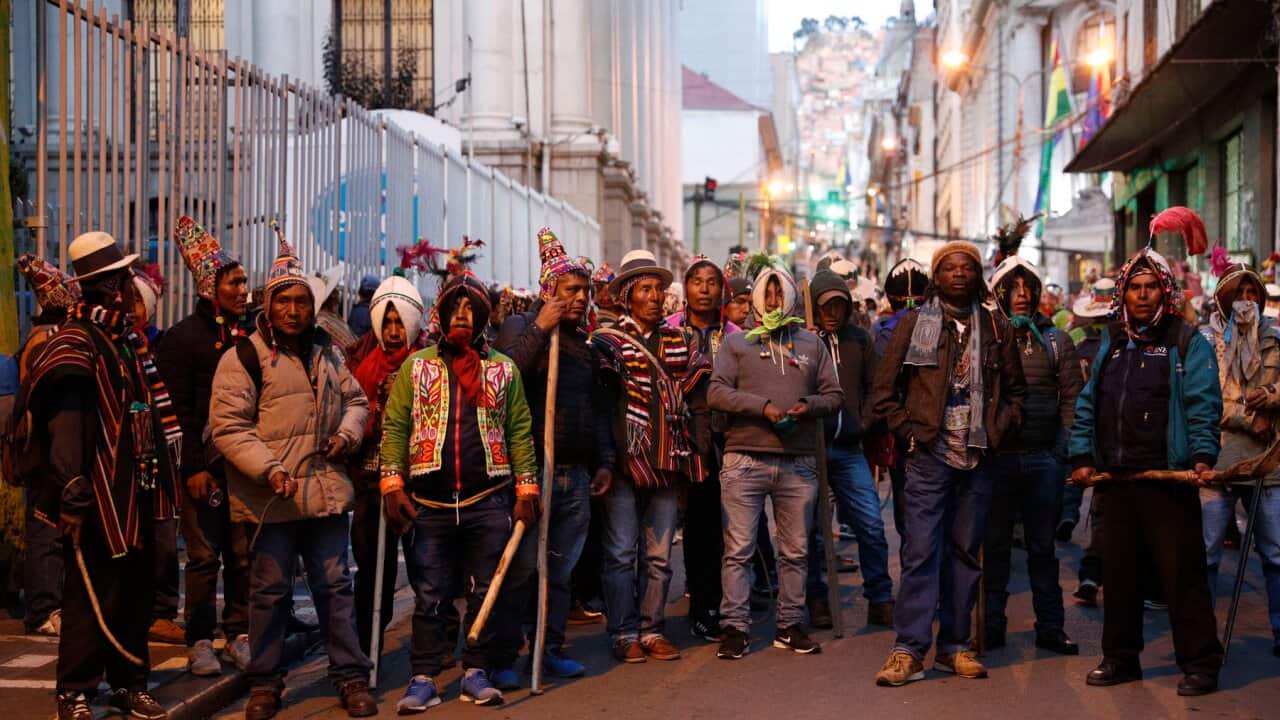 Evo Morales supporters prepare to confront demonstrators