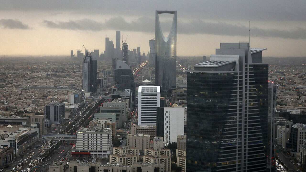 The Kingdom Tower, operated by Kingdom Holding Co., centre, stands on the skyline above the King Fahd highway in Riyadh, Saudi Arabia.
