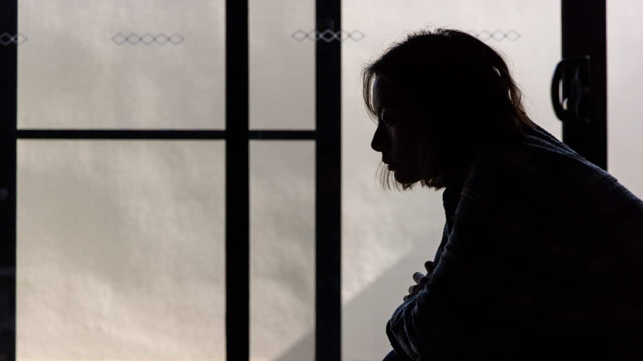 A person poses for a photograph in Melbourne, Friday, February 2, 2024. AAP.jpg