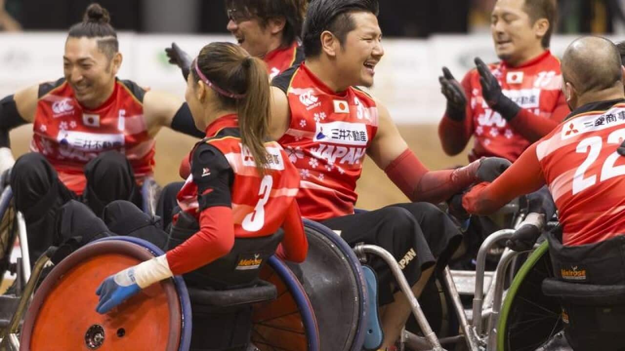 Japan players celebrate their victory.