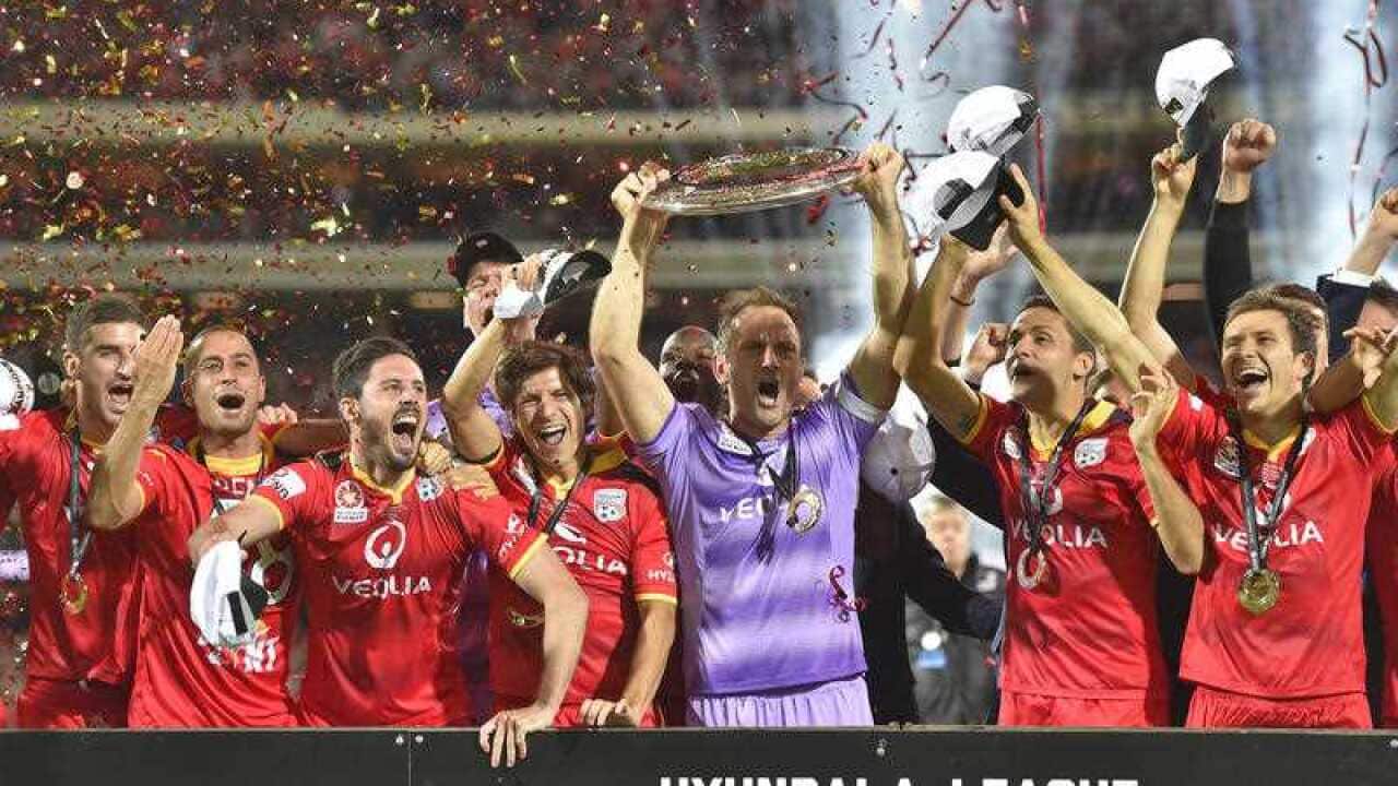 United players celebrate after winning the A-League Grand Final between Adelaide United and the Western Sydney Wanderers at Adelaide Oval in Adelaide