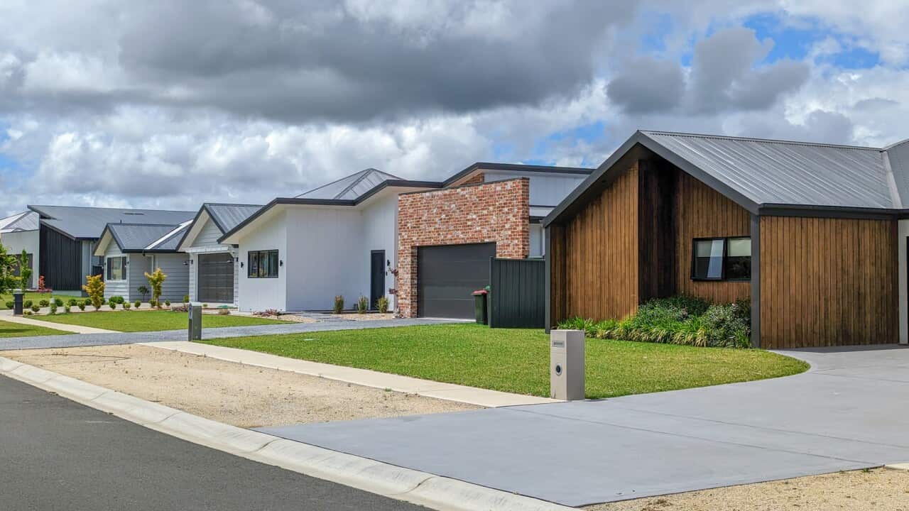 Modern houses footpath driveway clouds