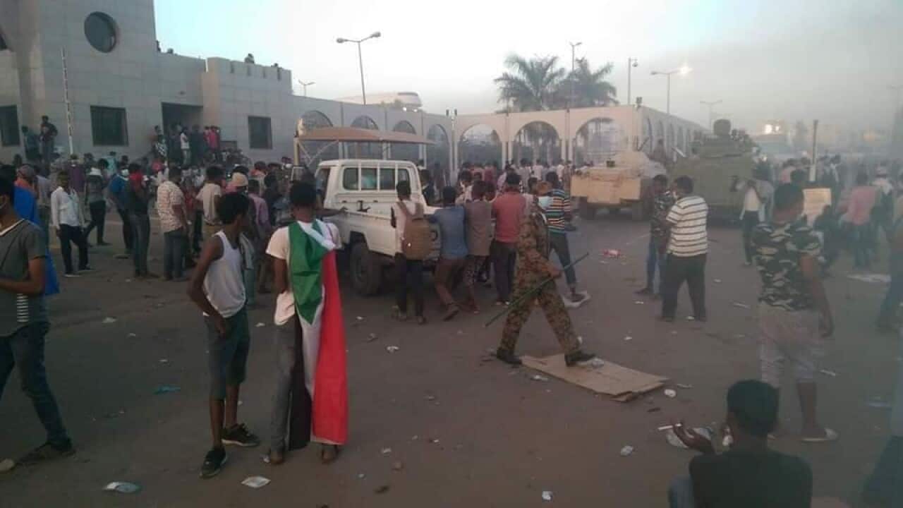 Sudanese protesters outside the military complex in Khartoum