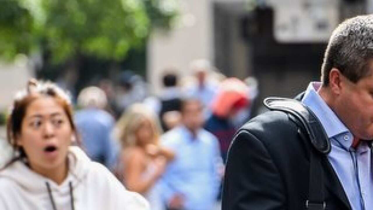 A man smokes a cigarette in Sydney, Wednesday, May 2, 2018. (AAP Image/Brendan Esposito) NO ARCHIVING