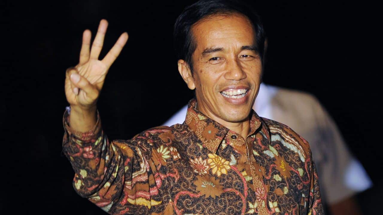 Indonesian newly elected president, Joko Widodo gestures after delivering his victory address (AAP).