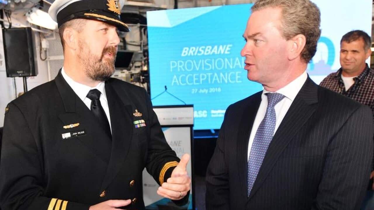 Commander Josh Wilson and Defence Industry Minister Christopher Pyne